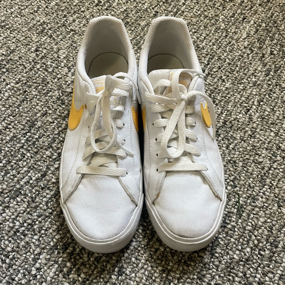 White and Yellow Nike Court